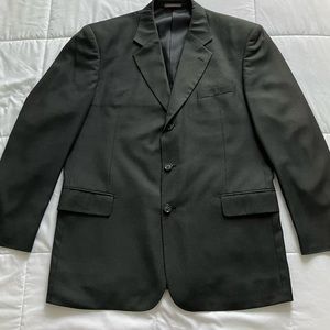 Men’s pin-striped black suit. 42R jacket 36 waist. In good condition.